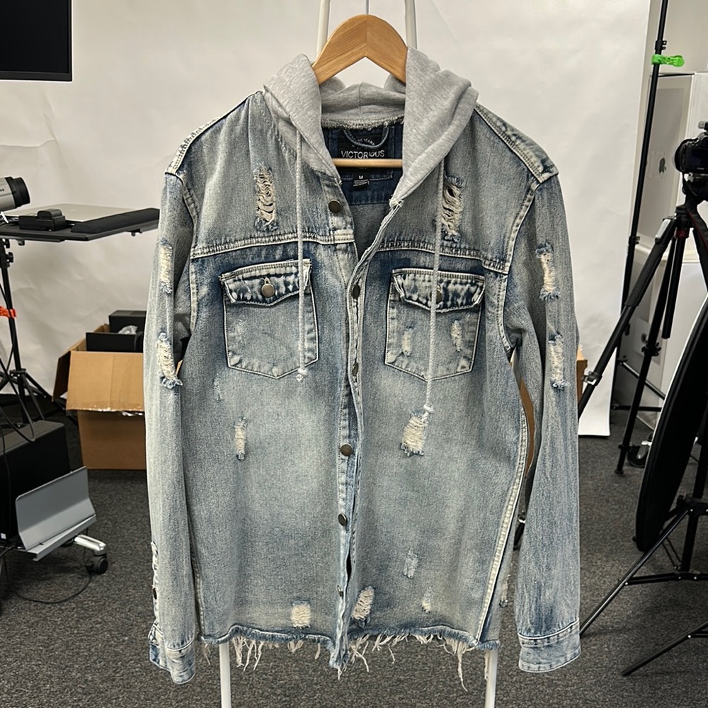 Distressed Denim Jacket with Gray Hood